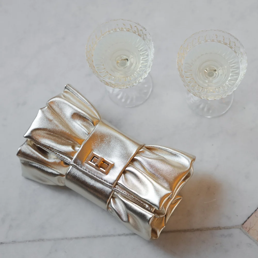 Firenze strik clutch gold bij Duifhuizen