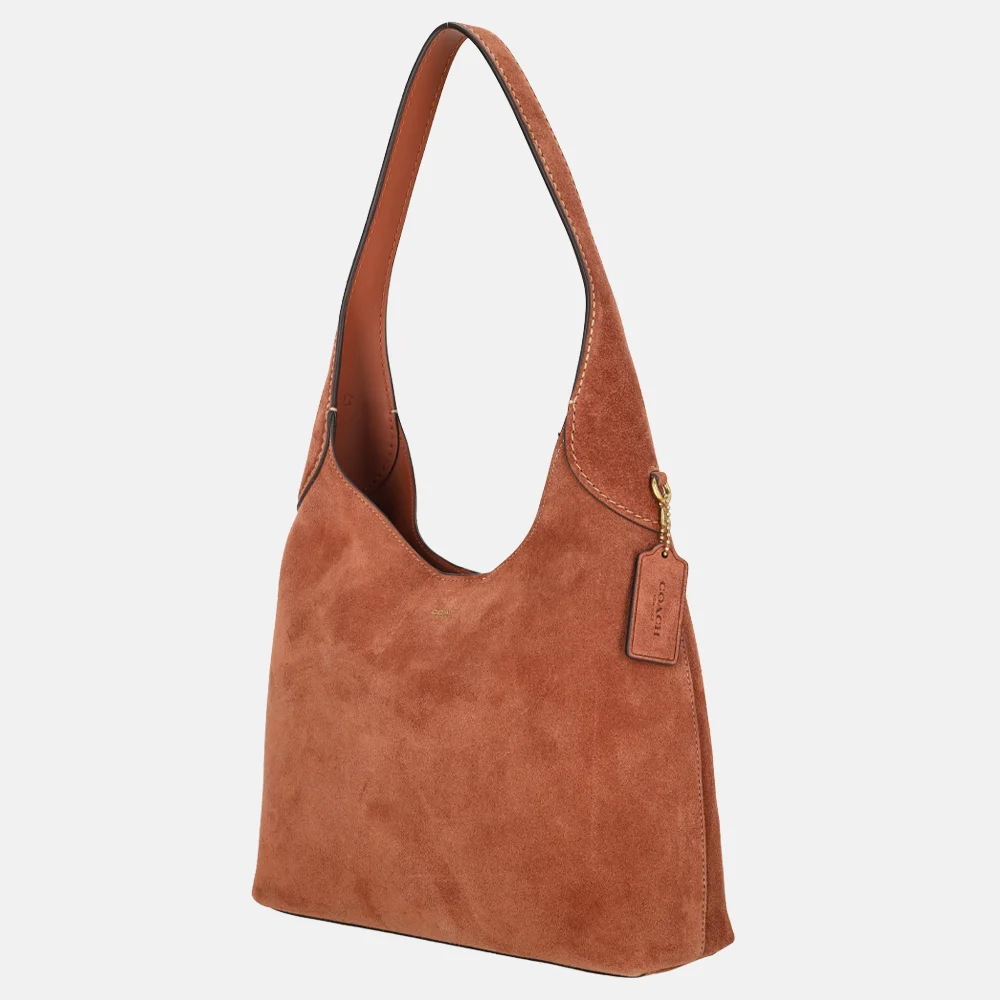 Coach Brooklyn suede buideltas 28' clay (goud) bij Duifhuizen