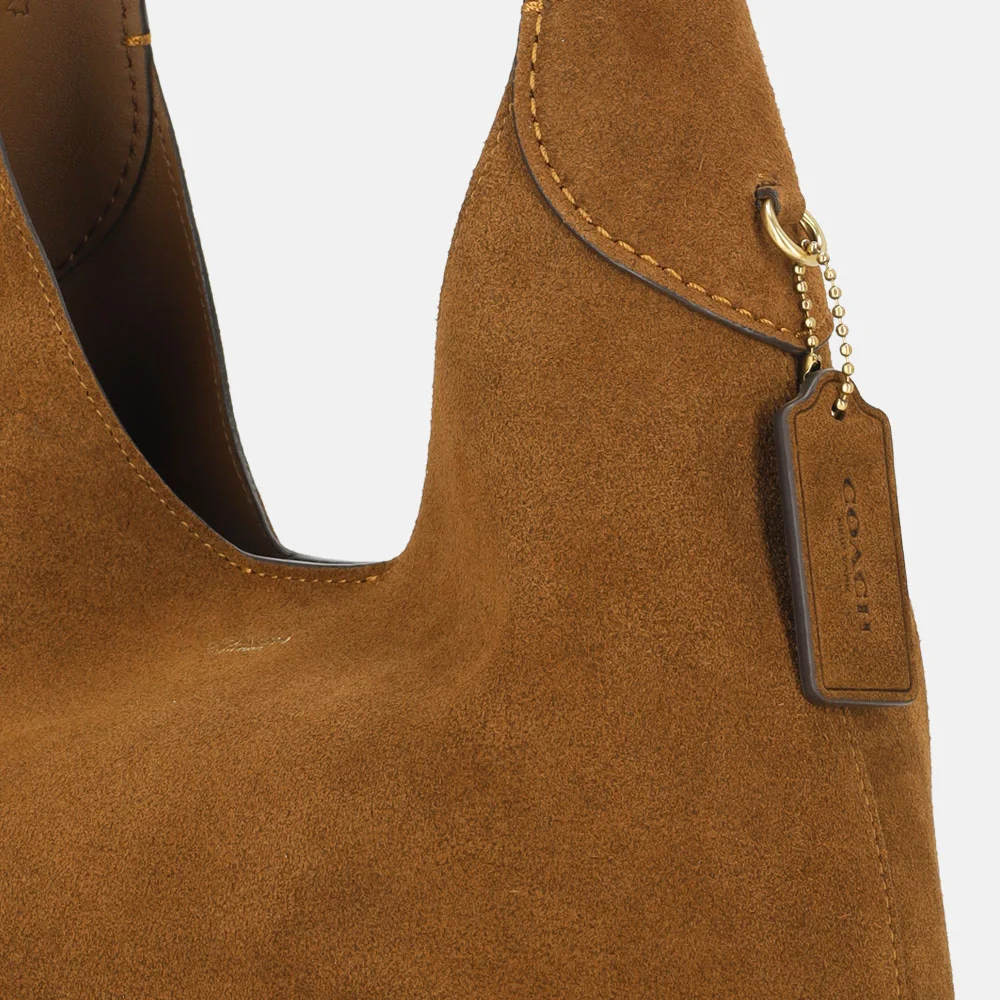 Coach Brooklyn suede buideltas 28' warm brown bij Duifhuizen